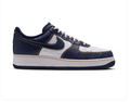 Nike Low-Top Sneakers – Navy, White & Gold with Embossed Details