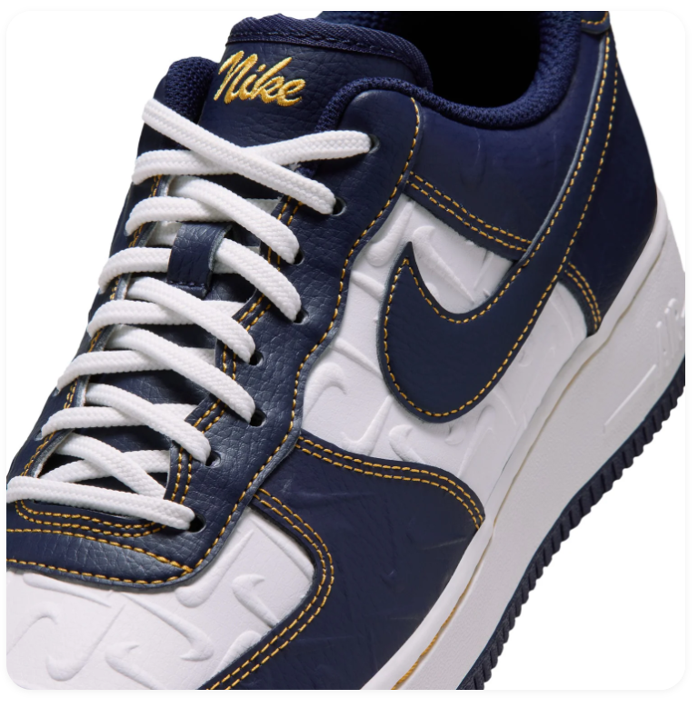 Nike Low-Top Sneakers – Navy, White & Gold with Embossed Details