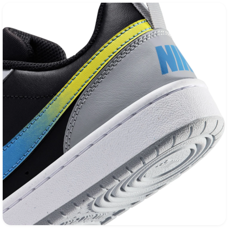 Nike Low-Top Sneakers – Black & Grey with Blue-to-Yellow Swoosh