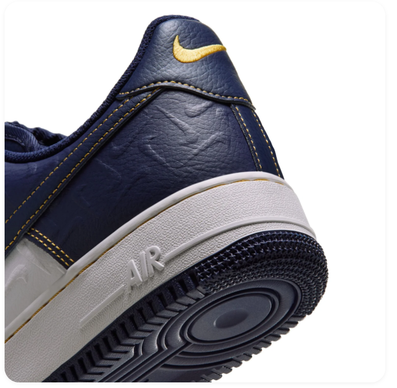 Nike Low-Top Sneakers – Navy, White & Gold with Embossed Details